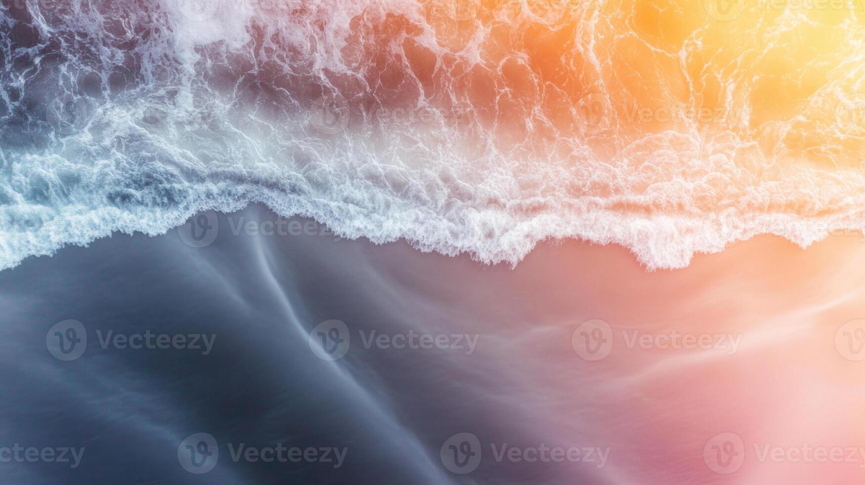 Colliding ocean waves create stunning patterns at sunset along the coastline photo