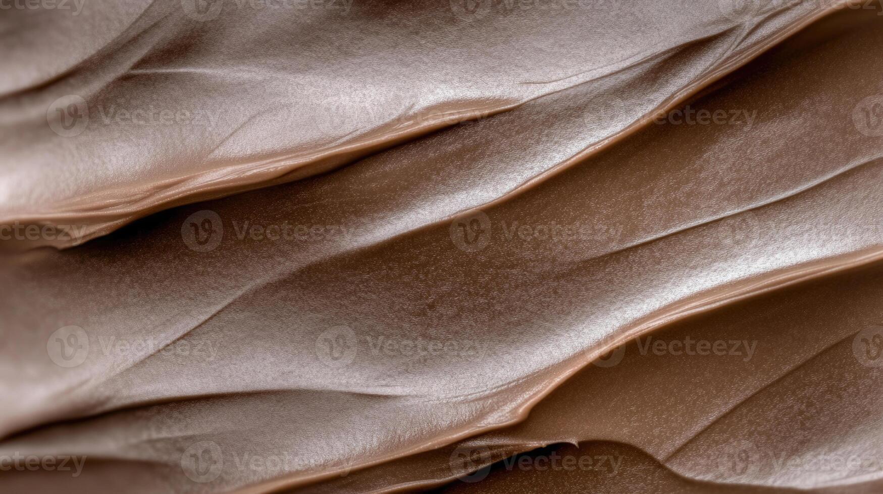 Rich brown paint texture with smooth, flowing layers and warm tones photo