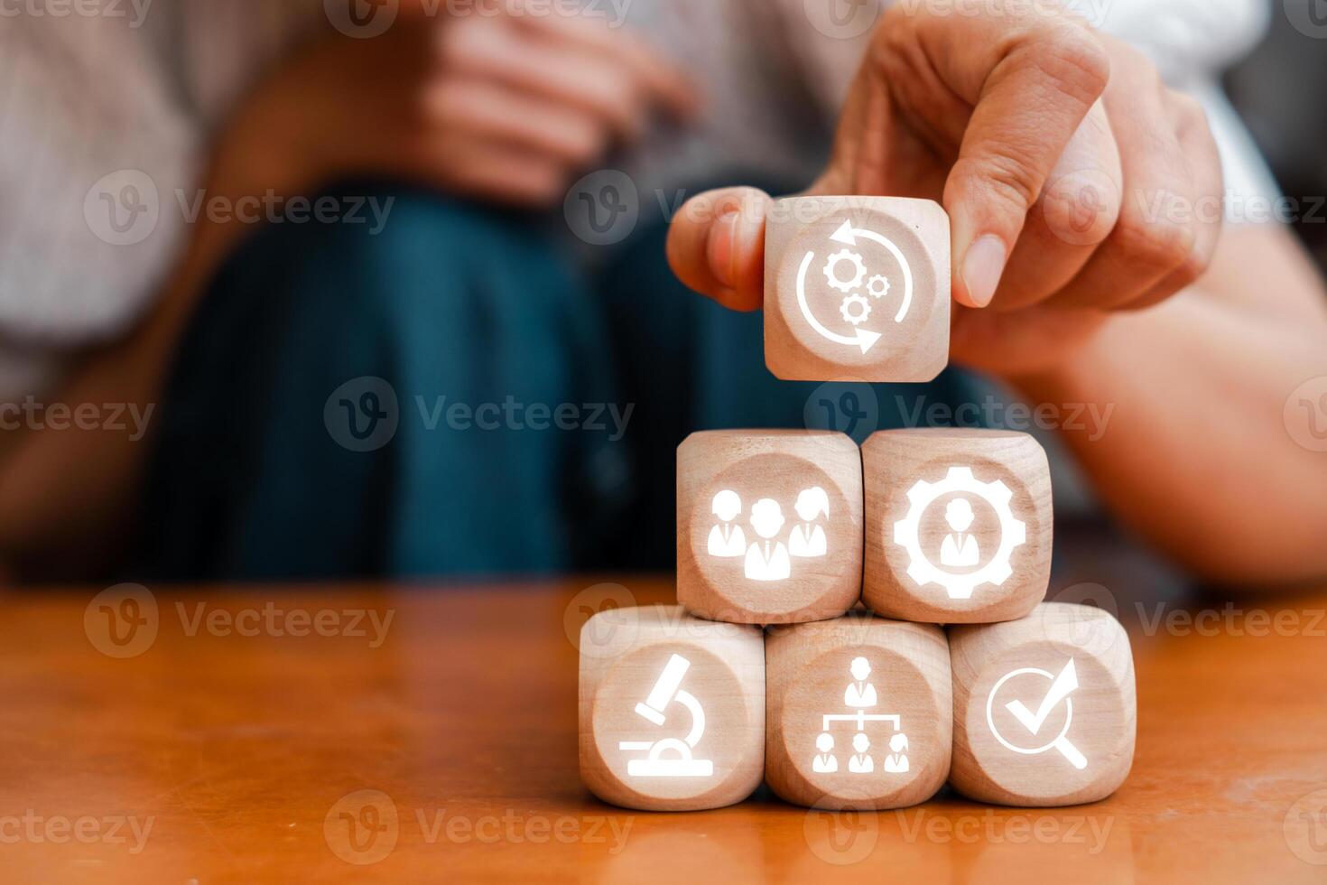 Wooden blocks symbolizing total quality management, showcasing teamwork, efficiency, and continuous improvement in business processes. photo