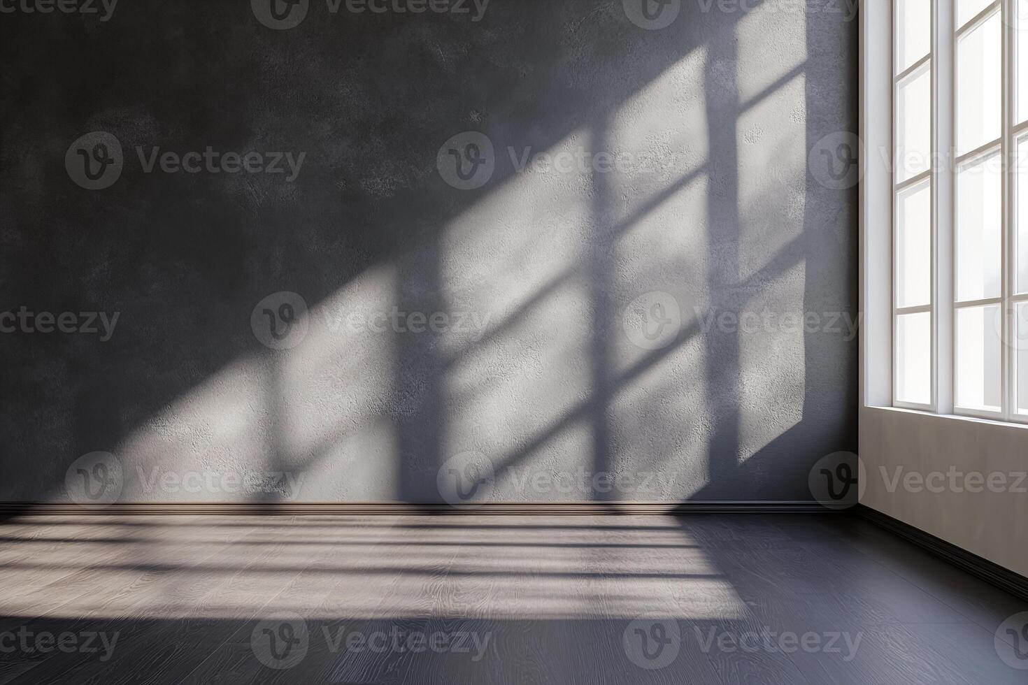 This modern empty room features deep charcoal walls and a matte black floor, illuminated by soft natural light. The shadows create a bold atmosphere suitable for high-end showcases photo