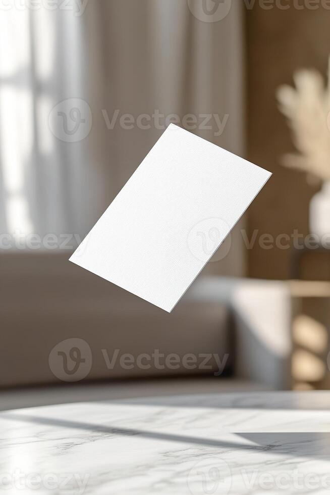 A single blank business card is elegantly suspended in midair, casting a soft shadow underneath. The softly blurred gradient background enhances the sleek, modern aesthetic ideal for branding photo