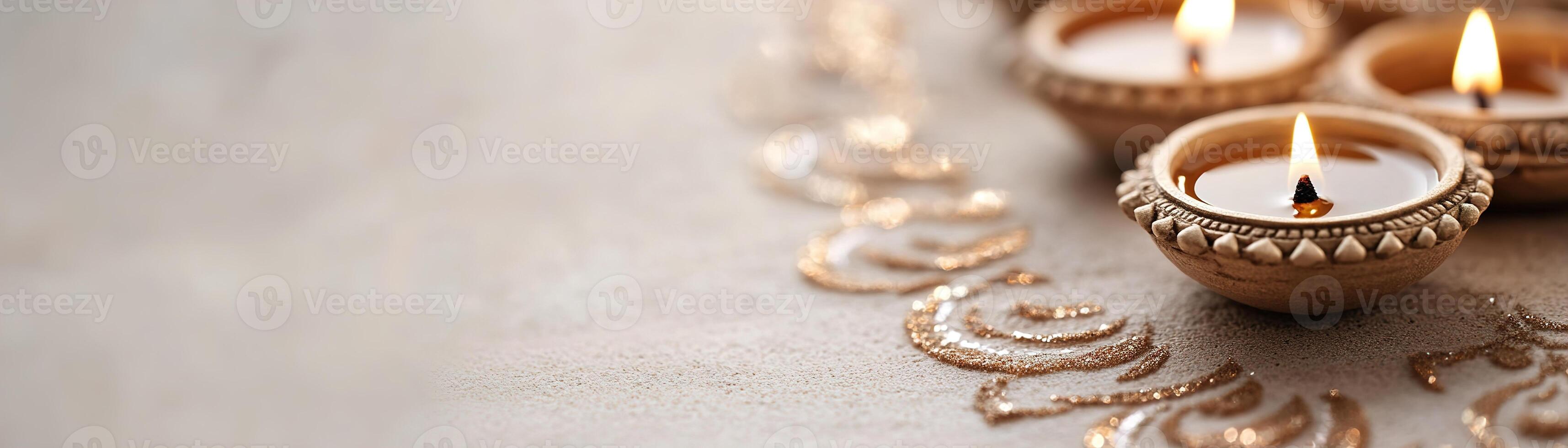 Soft golden light from traditional oil lamps enhances beautifully detailed Rangoli patterns, setting a celebratory tone perfect for festival greetings and marketing materials photo