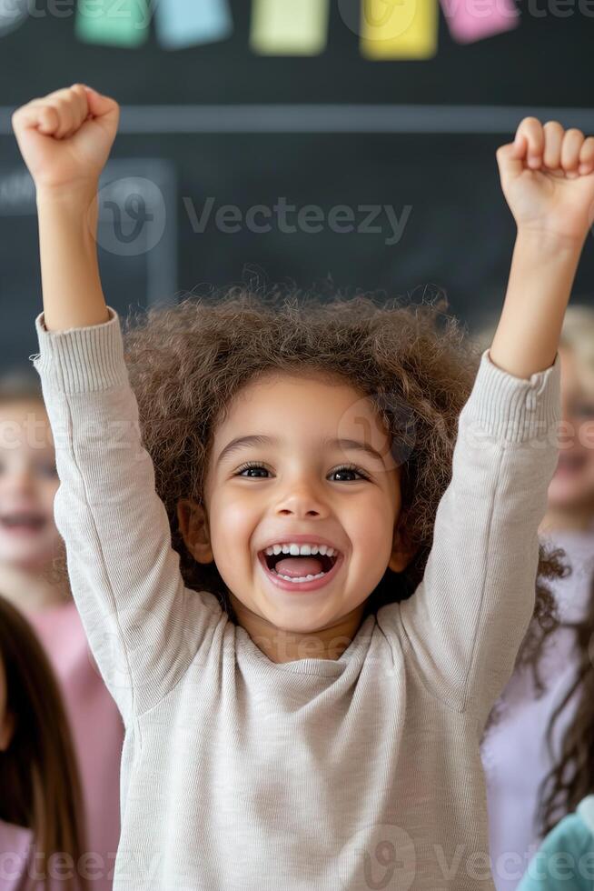 Students in a well-lit classroom raise their hands enthusiastically, displaying joy and excitement as they participate in a lesson. The atmosphere is dynamic and inspiring photo