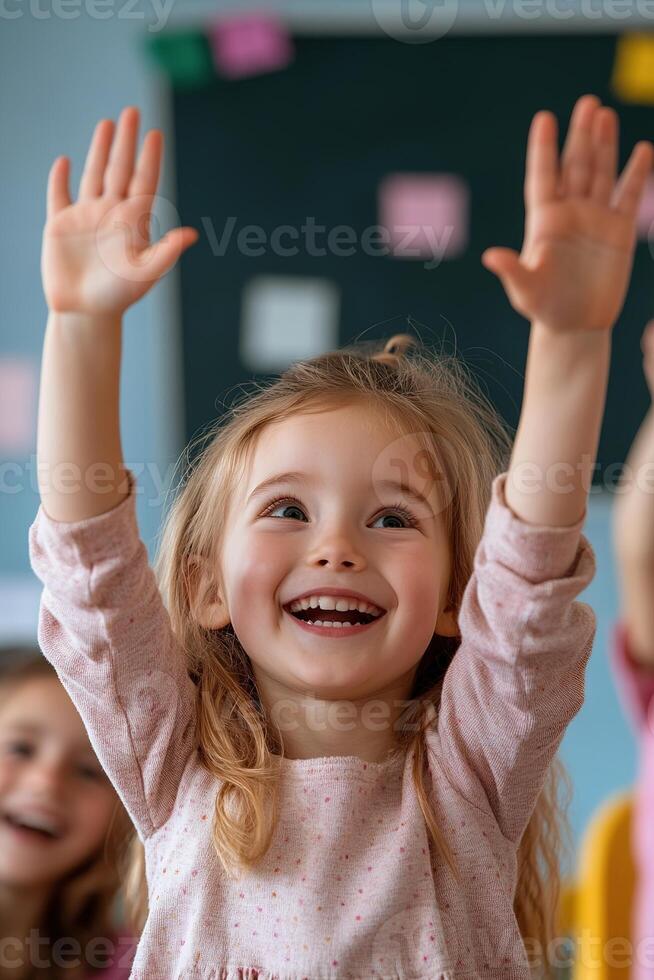A group of young students in a well-lit classroom express their enthusiasm by raising their hands during an engaging lesson. Their faces reflect joy and curiosity in the learning environment photo