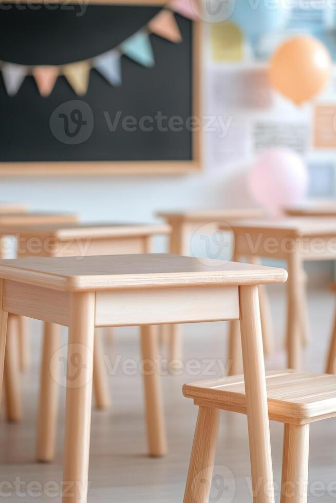 Softly lit primary school classroom features neatly arranged small wooden desks, colorful posters on the walls, and a welcoming chalkboard, perfect for young learners and educational activities photo