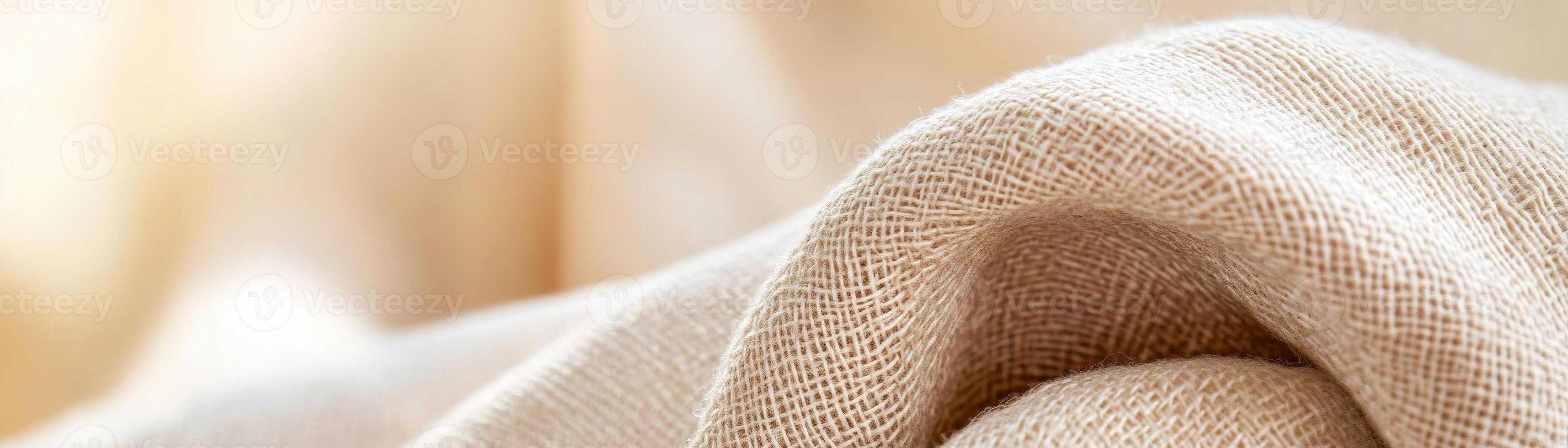 The soft, abstract footer showcases a woven linen fabric in warm beige tones. Its subtle texture and soft focus create an inviting background perfect for lifestyle and home decor promotions photo