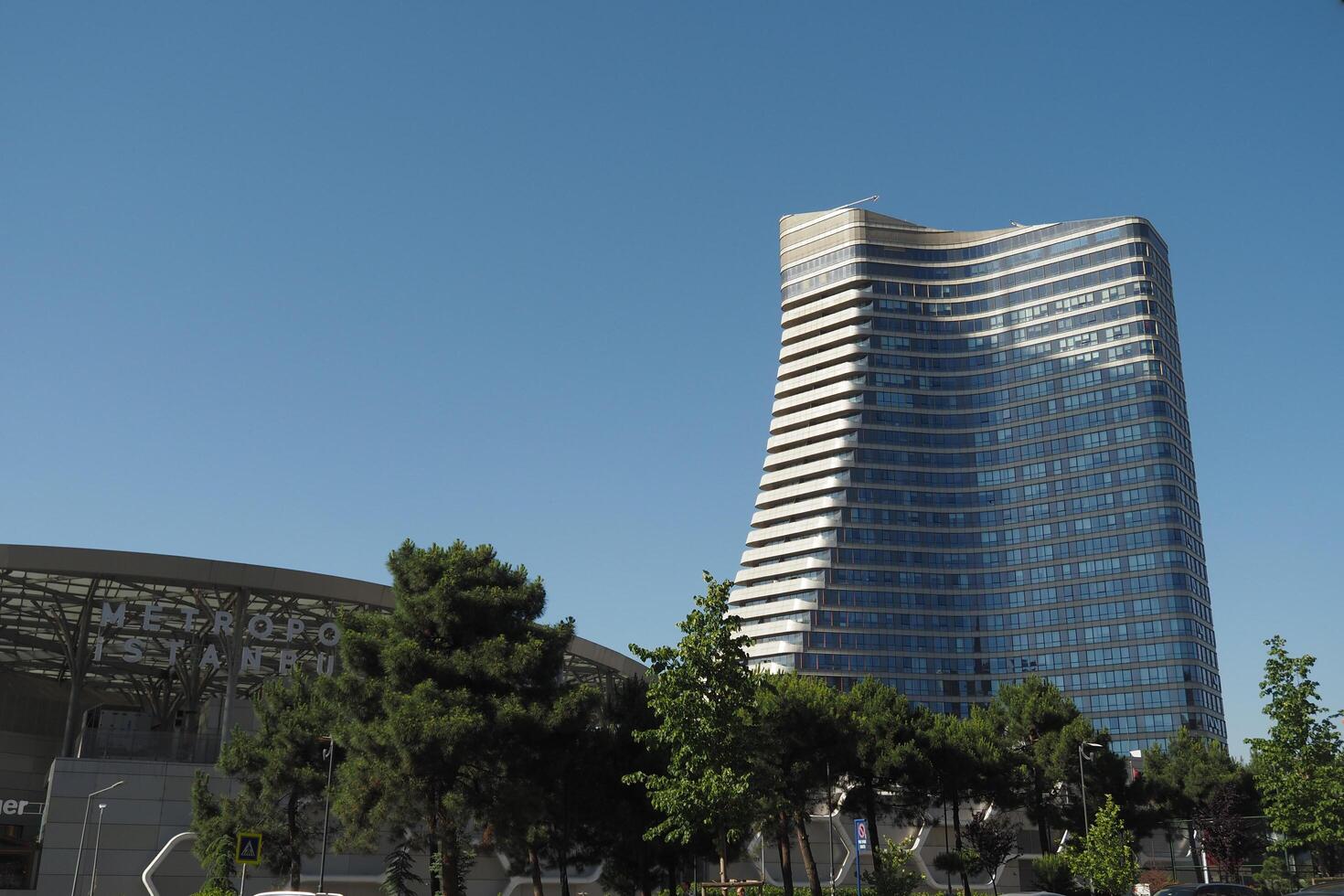 Modern architecture in a vibrant city skyline during daytime photo