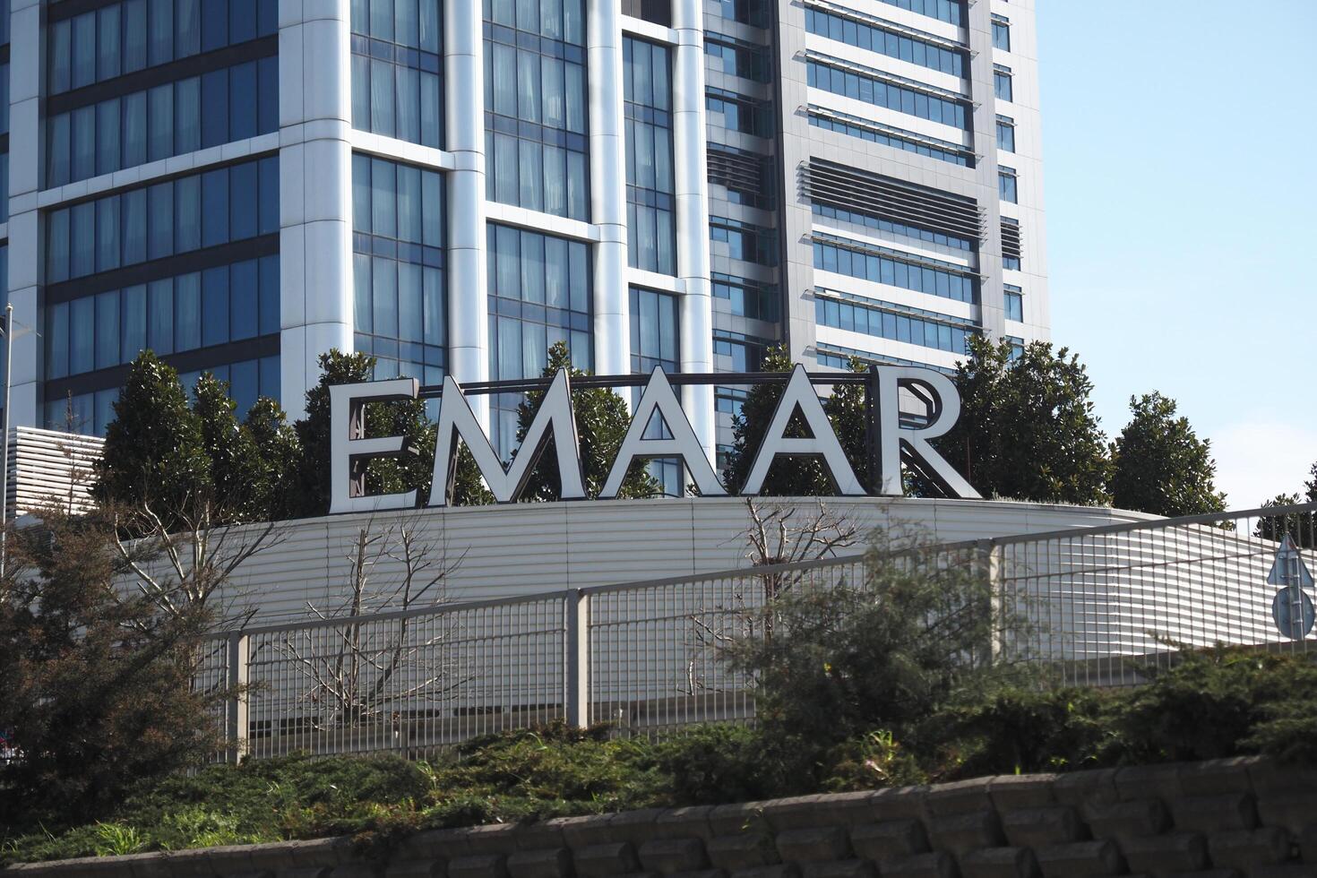 turkey istanbul 23 january 2025 Emaar shopping mall sign displayed prominently amidst modern architecture in the city photo
