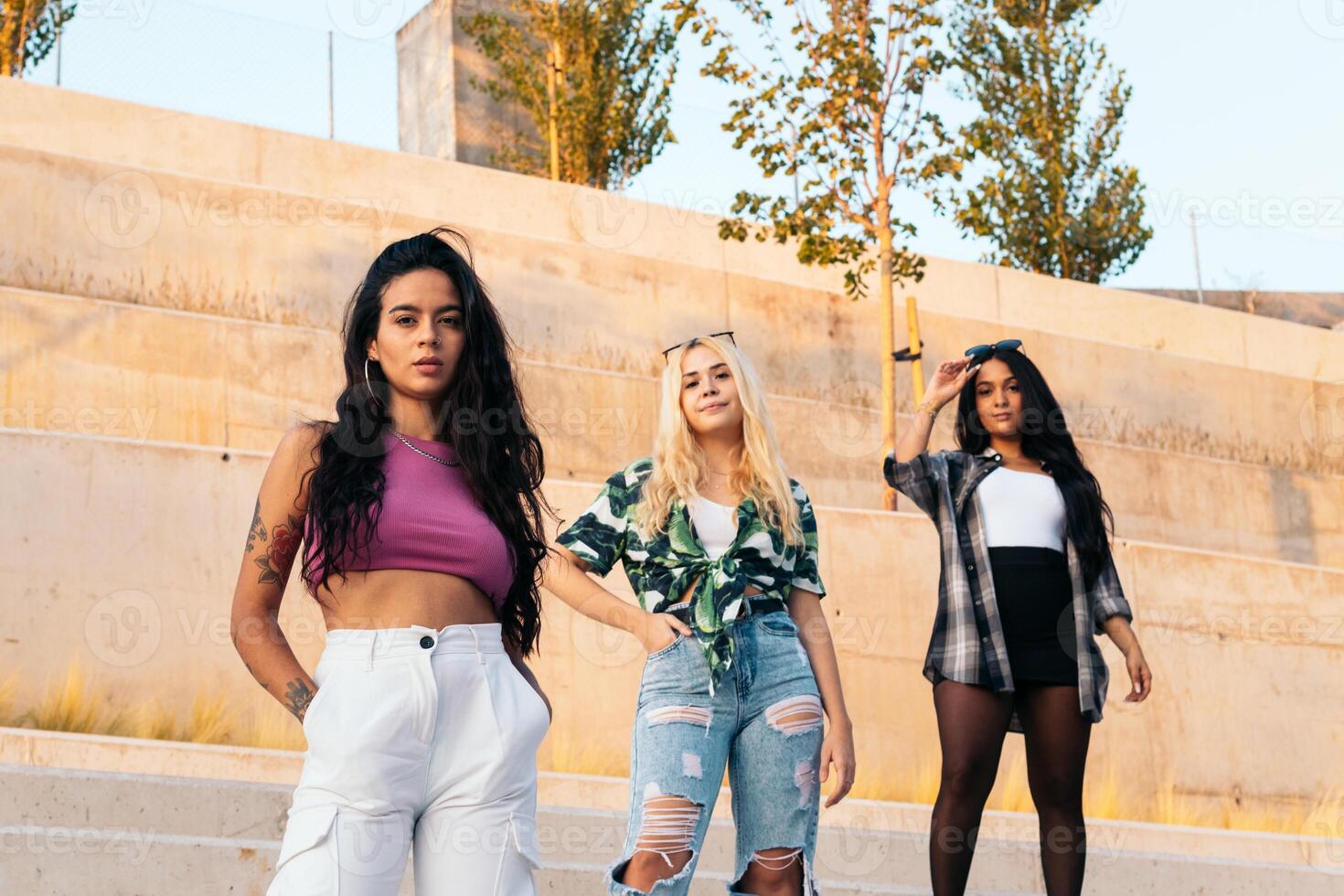 Multicultural urban girls hanging out photo
