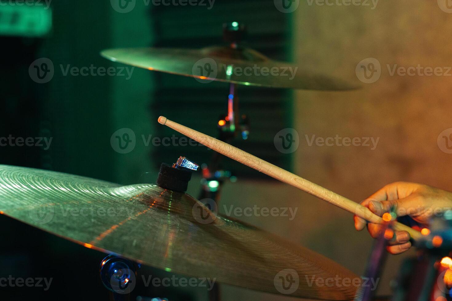 Drummer In Stage With Colorful Lights photo