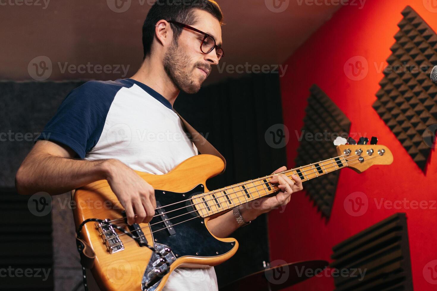 Close-up of a musician playing bass photo