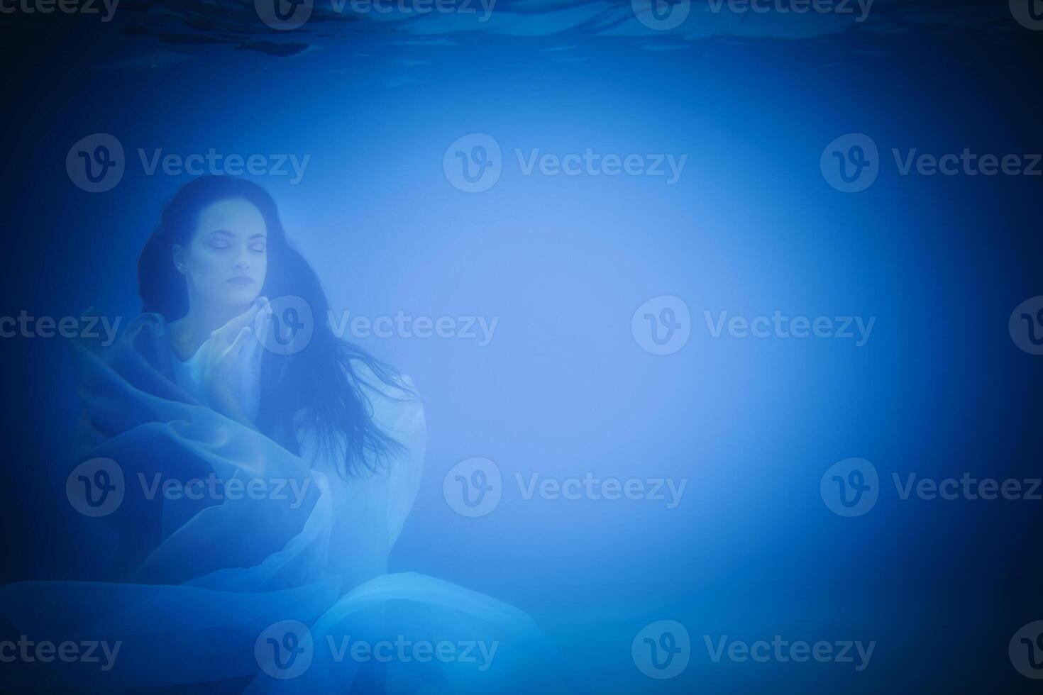 Underwater portrait of woman photo