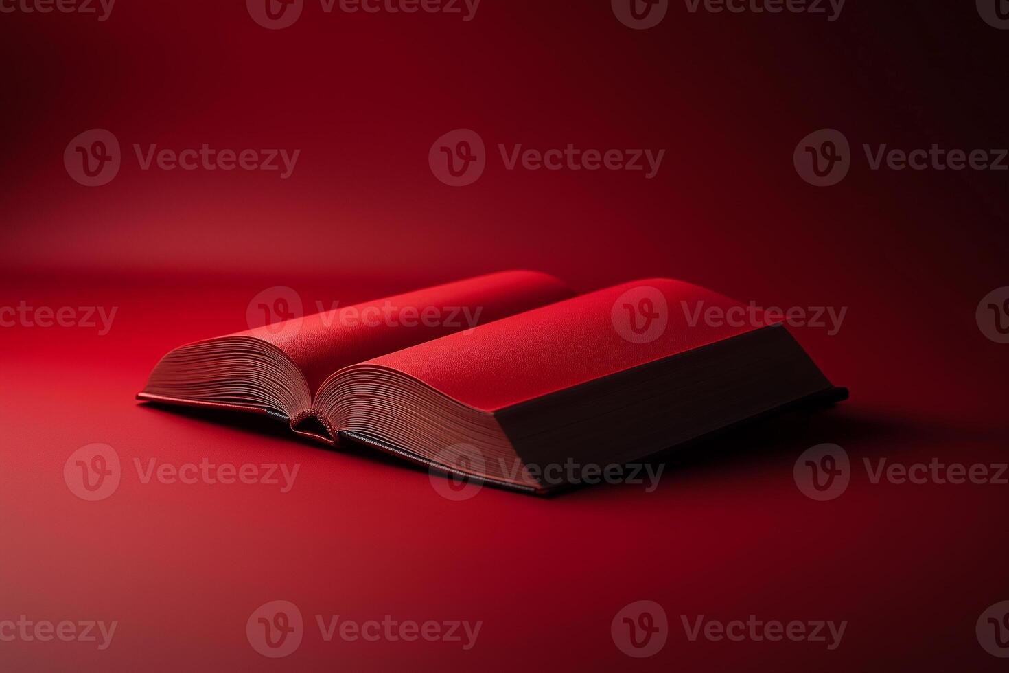 Red covered book lying open on coordinating surface, reading moment World Knowledge Day copy space photo