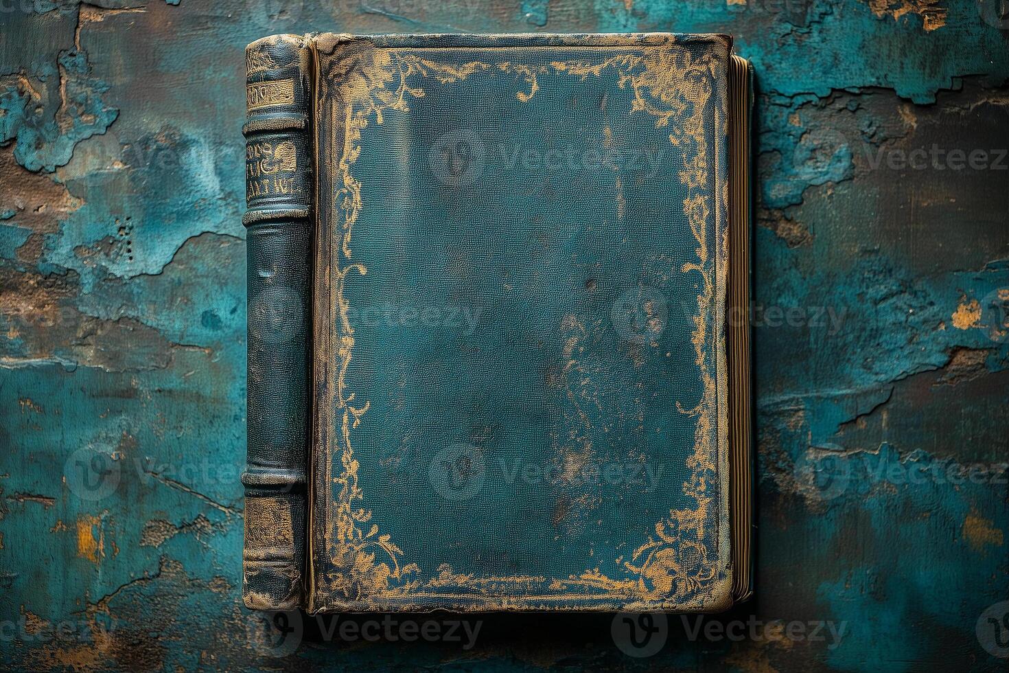 Vintage teal gold book lying on textured surface, World Knowledge Day copy space mockup photo