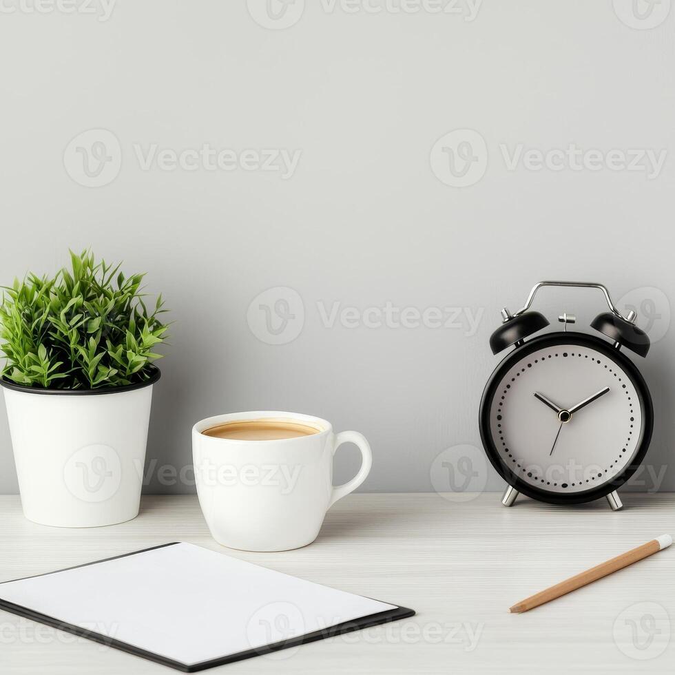 Management efficiency and goal-setting concept. A cozy workspace with a plant, coffee, clock, and blank notebook on a clean surface. photo