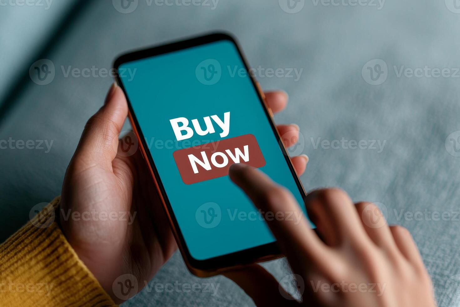 e-commerce checkout process concept A person tapping a smartphone with a Buy Now button displayed on the screen. photo