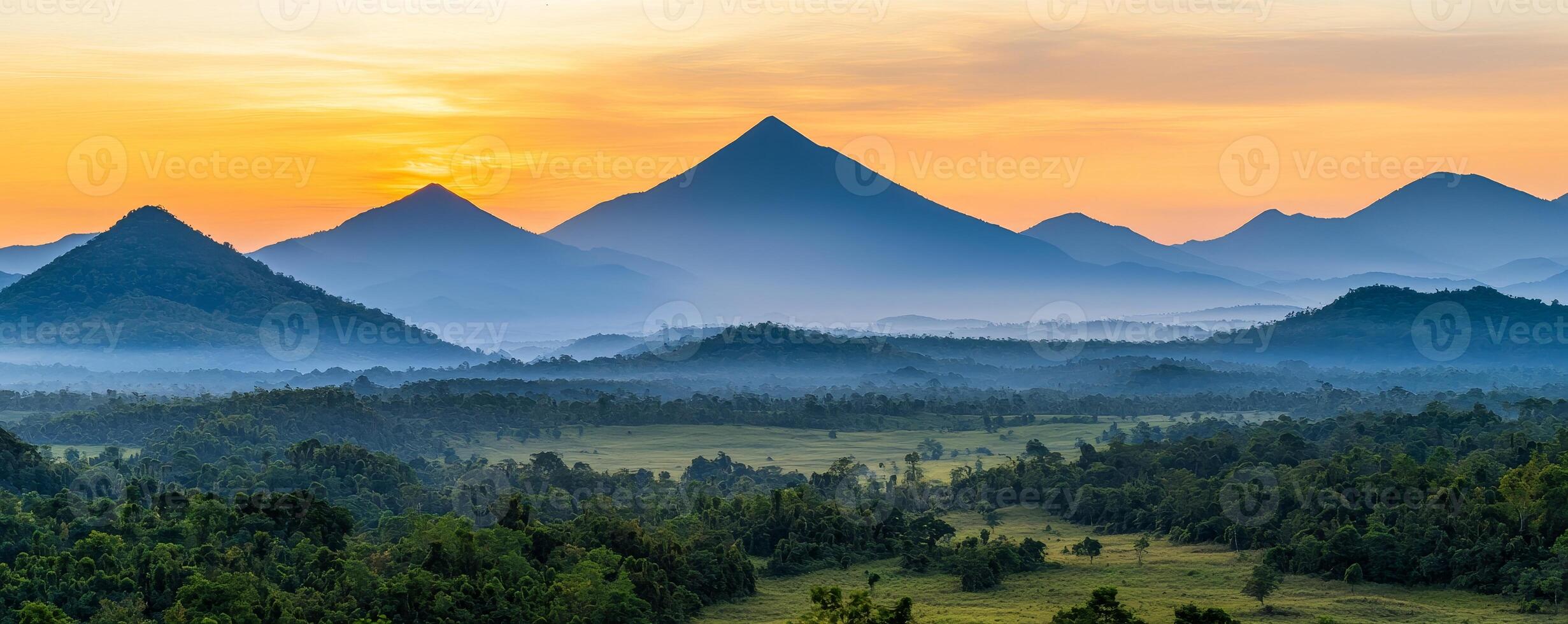 Transformation growth mindset concept. A stunning sunrise over a mountainous landscape, with layers of hills and a misty foreground creating a serene and picturesque view. photo