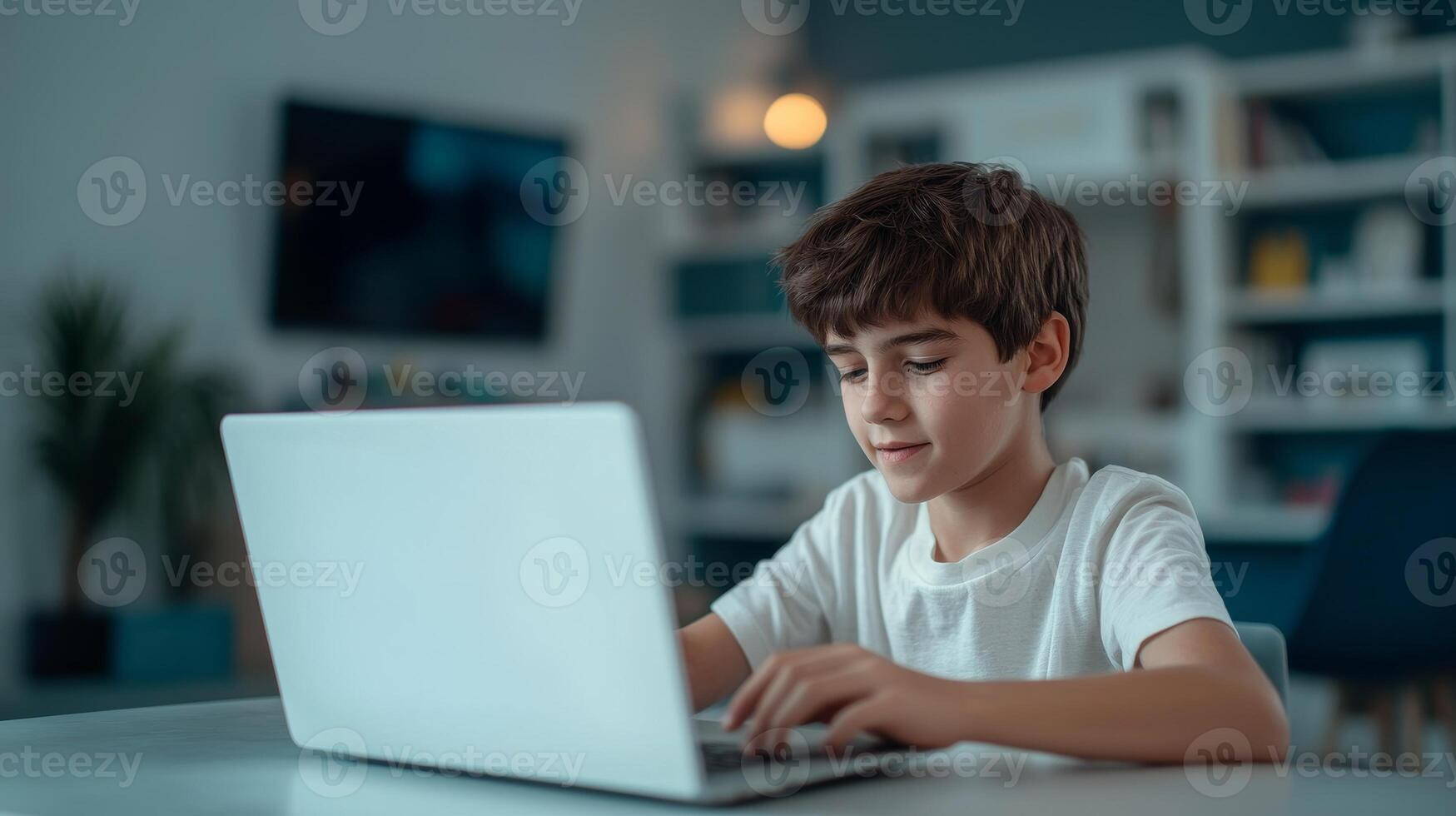 Personalized learning for education concept. A boy sits at a table, using a laptop, in a cozy room with modern decor and soft lighting. photo