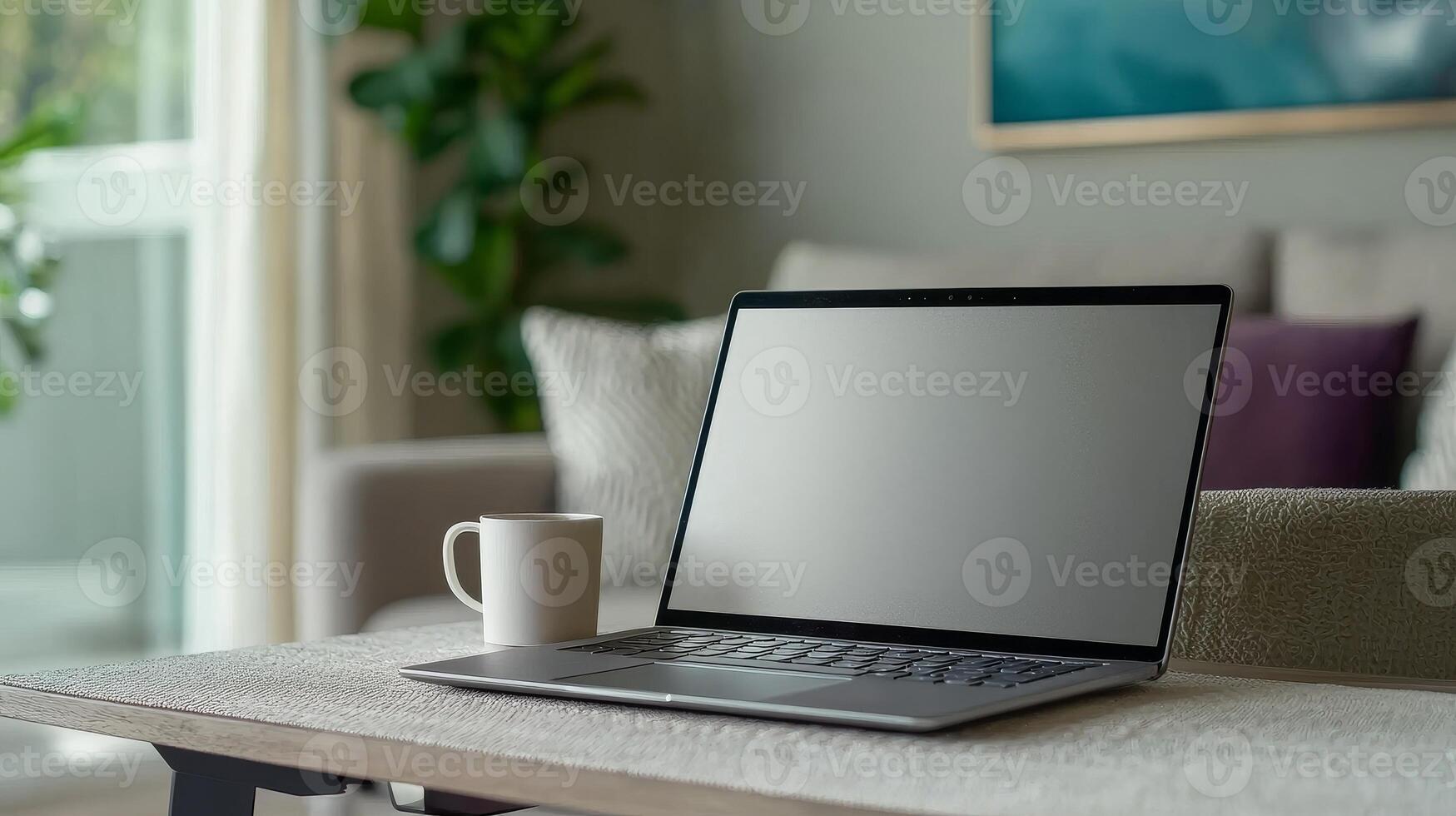 Business entrepreneurship with remote work concept. Workspace featuring a laptop on a table, accompanied by a coffee cup, in a cozy indoor setting with plants in the background. photo