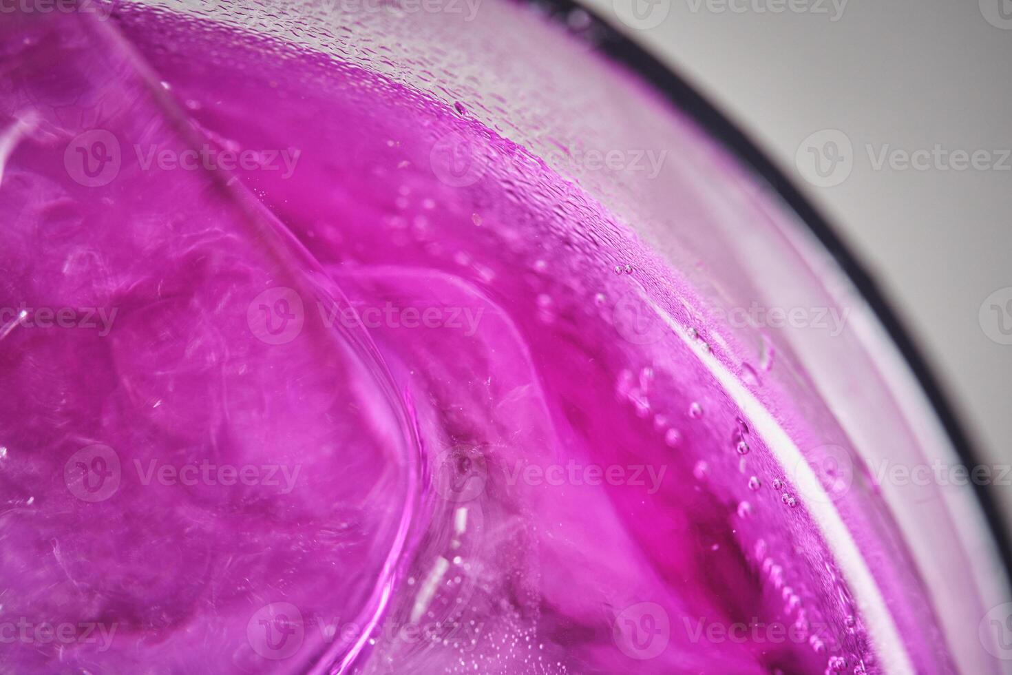 A close up of a purple liquid in a glass photo