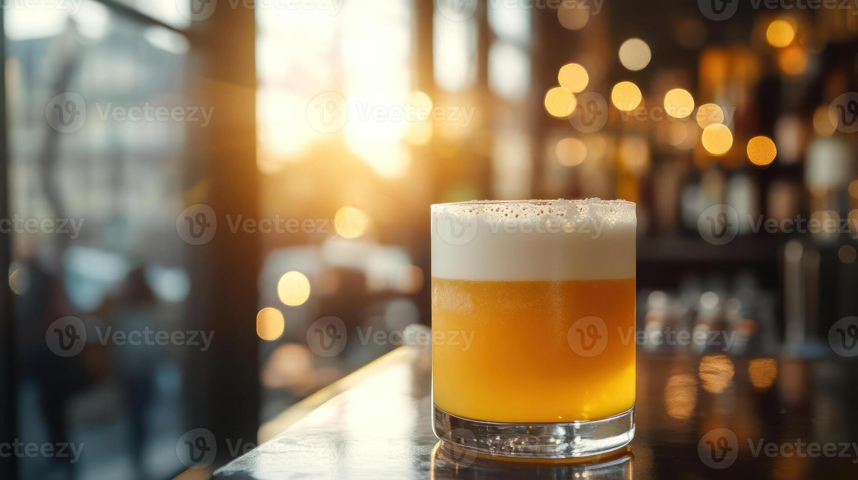 A glass of beer on a bar counter. photo