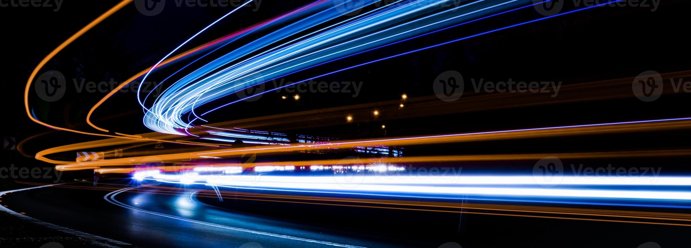 lights of moving cars at night. long exposure.orange and blue photo