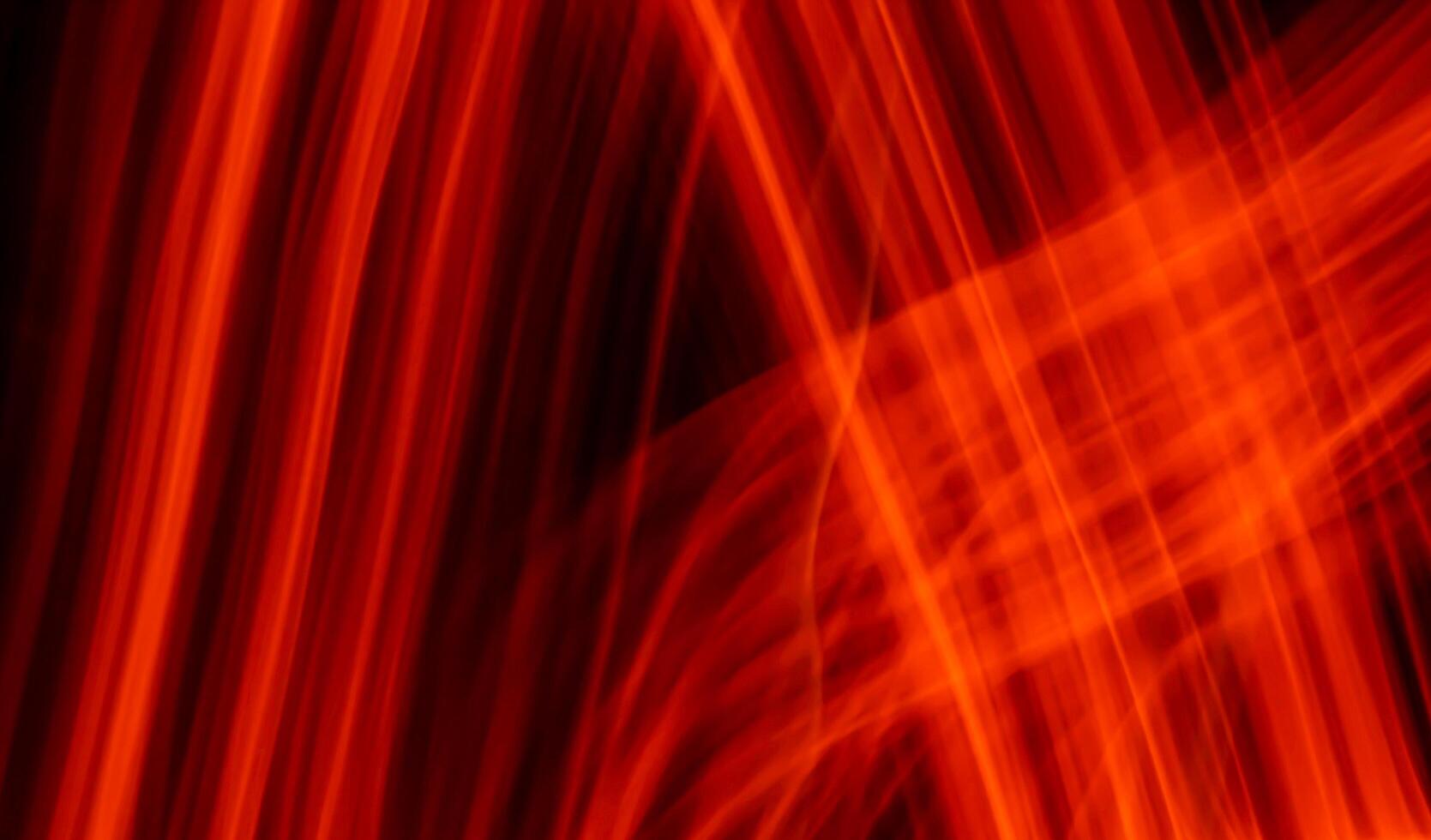 red luminous lines on a black background. photo