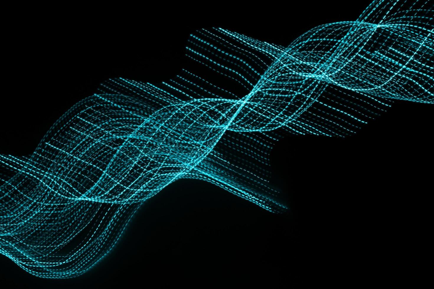 blue dotted lines of lights on a black background photo