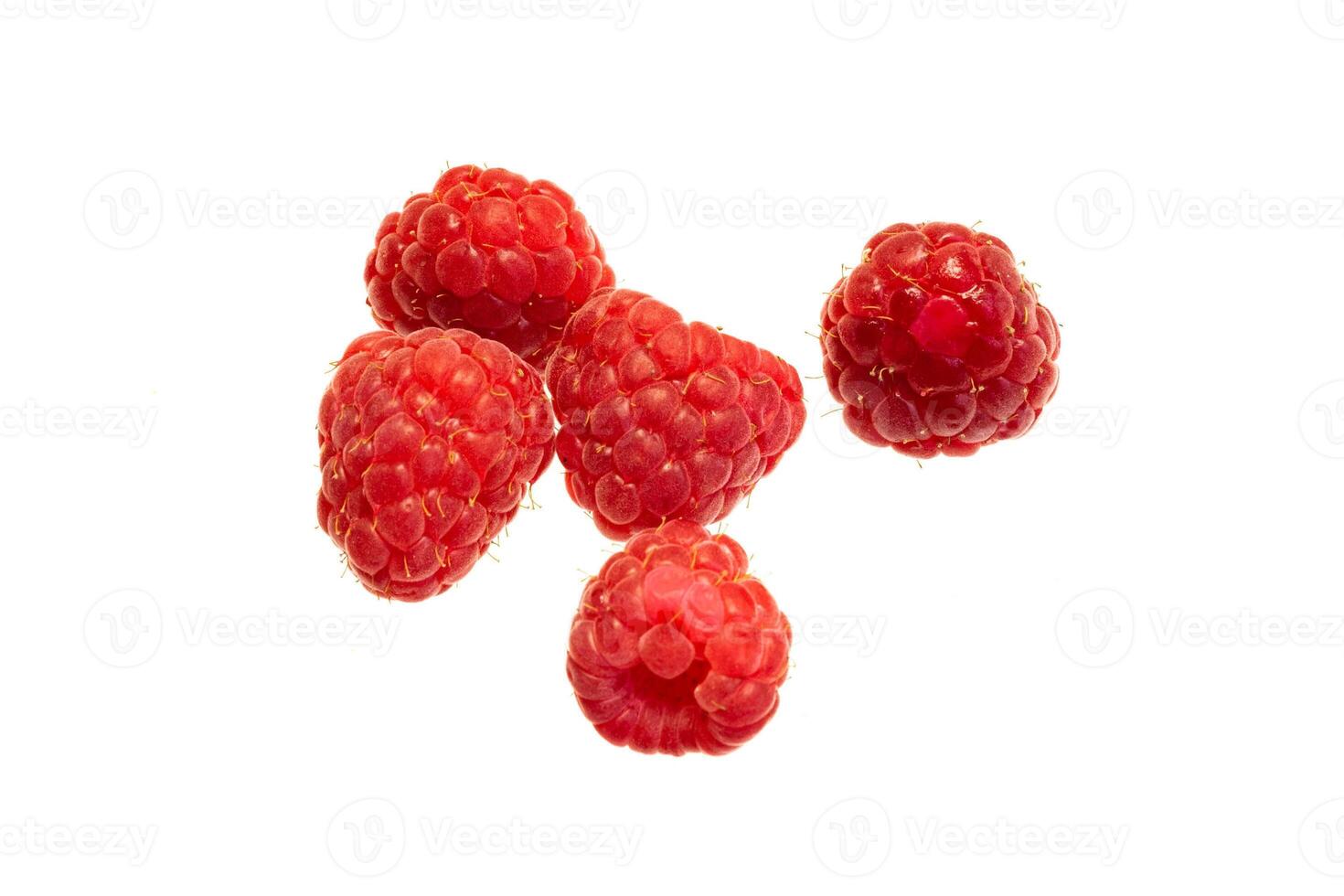 red raspberries on a white isolated background photo