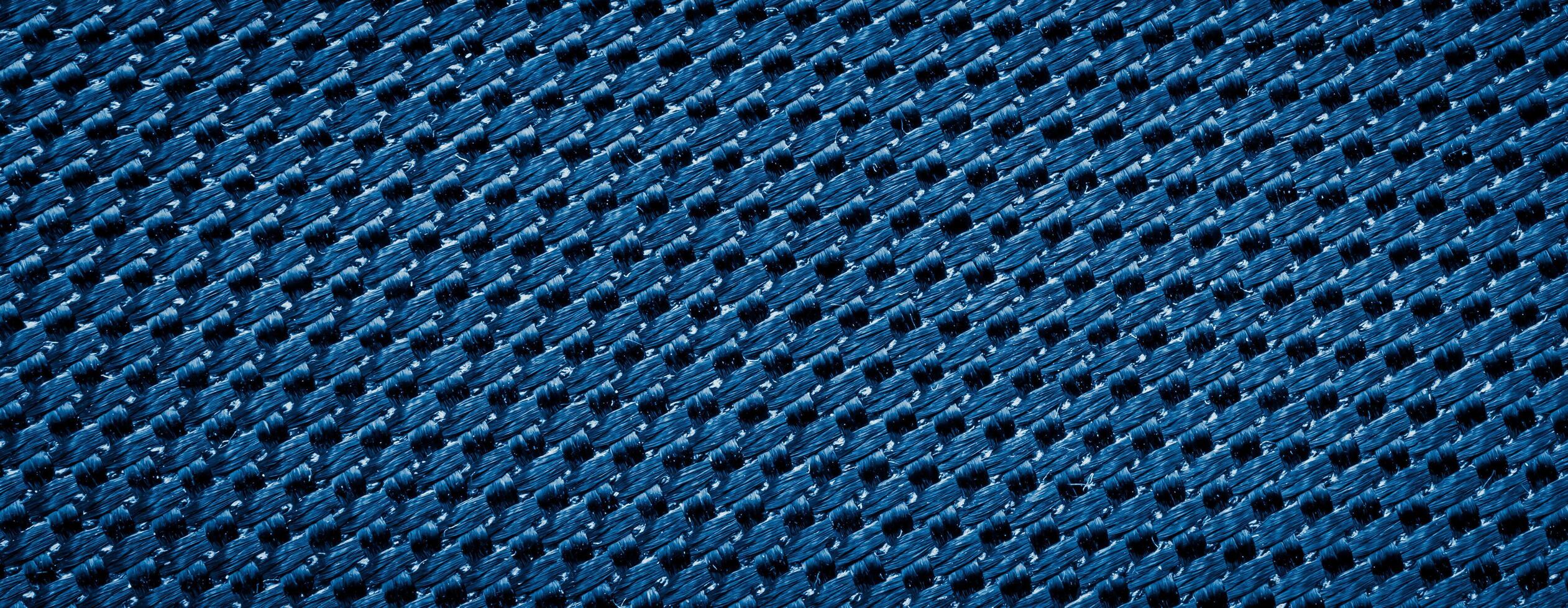 blue fabric with a visible texture. background photo