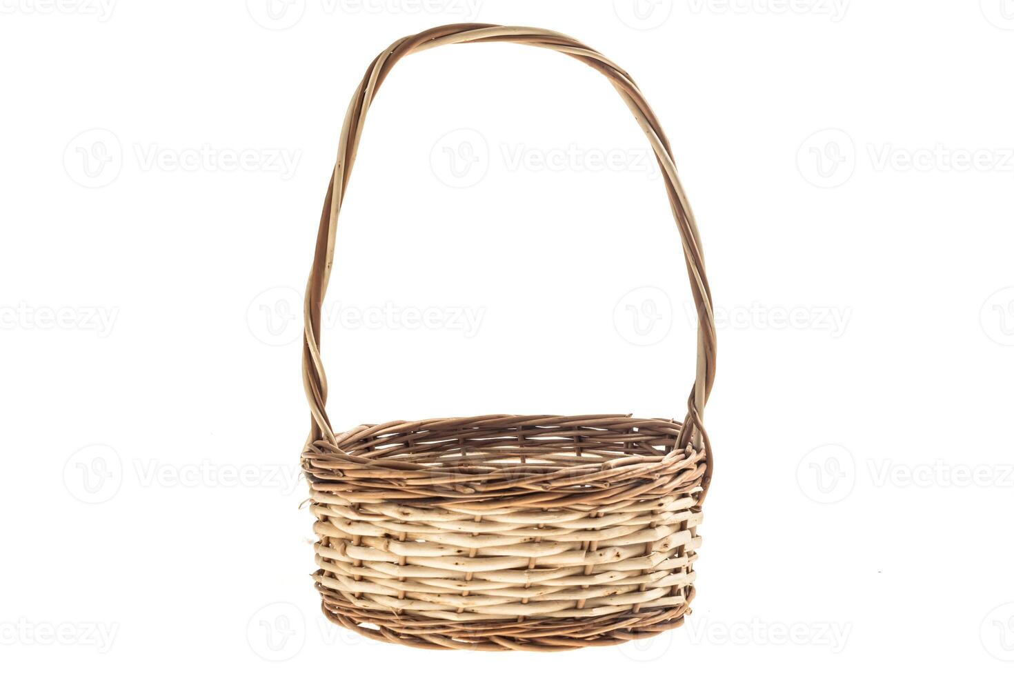 Wicker basket with a white isolated background photo