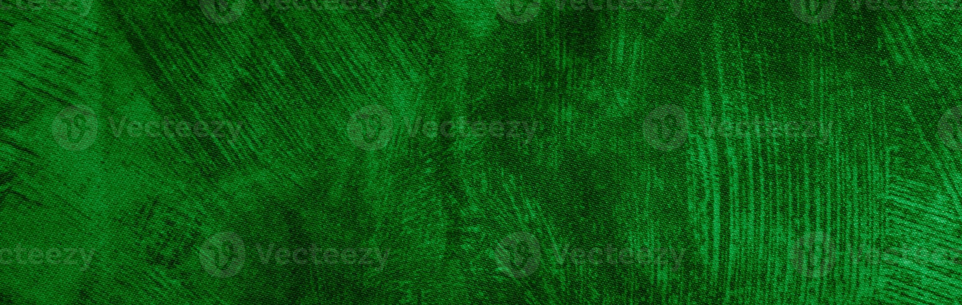 green cotton material with visible texture. background photo