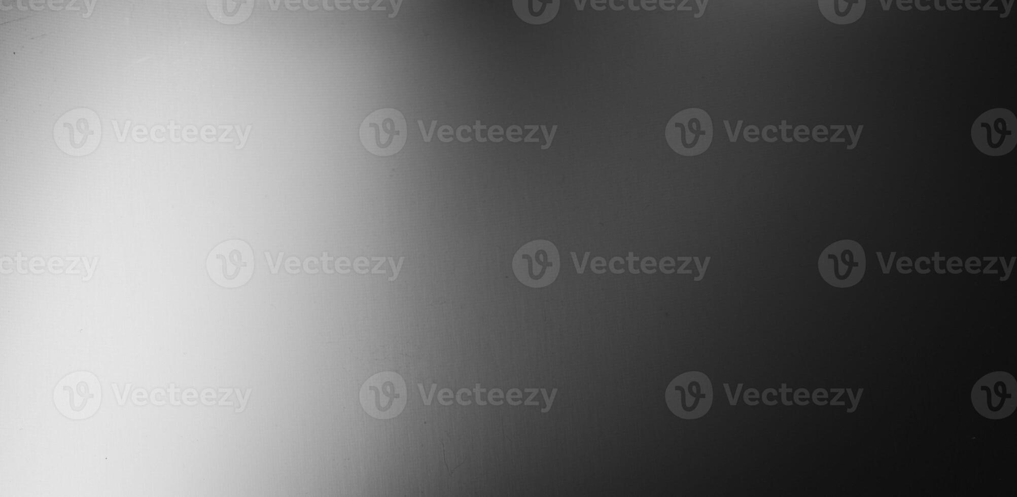 scratched silver metal sheet with visible texture. background photo