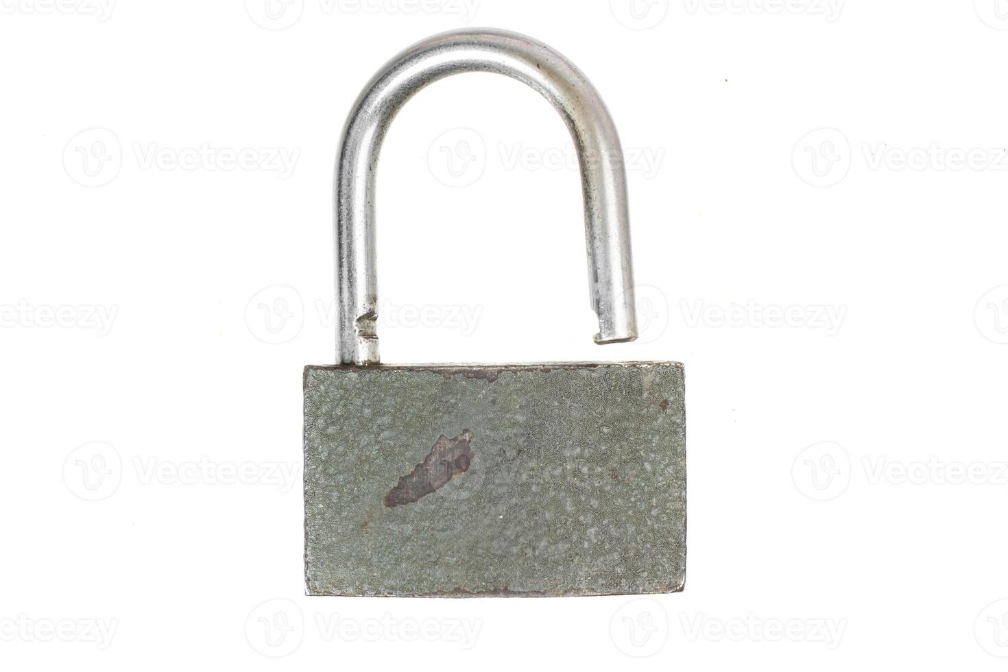 old padlock on a white isolated background. photo