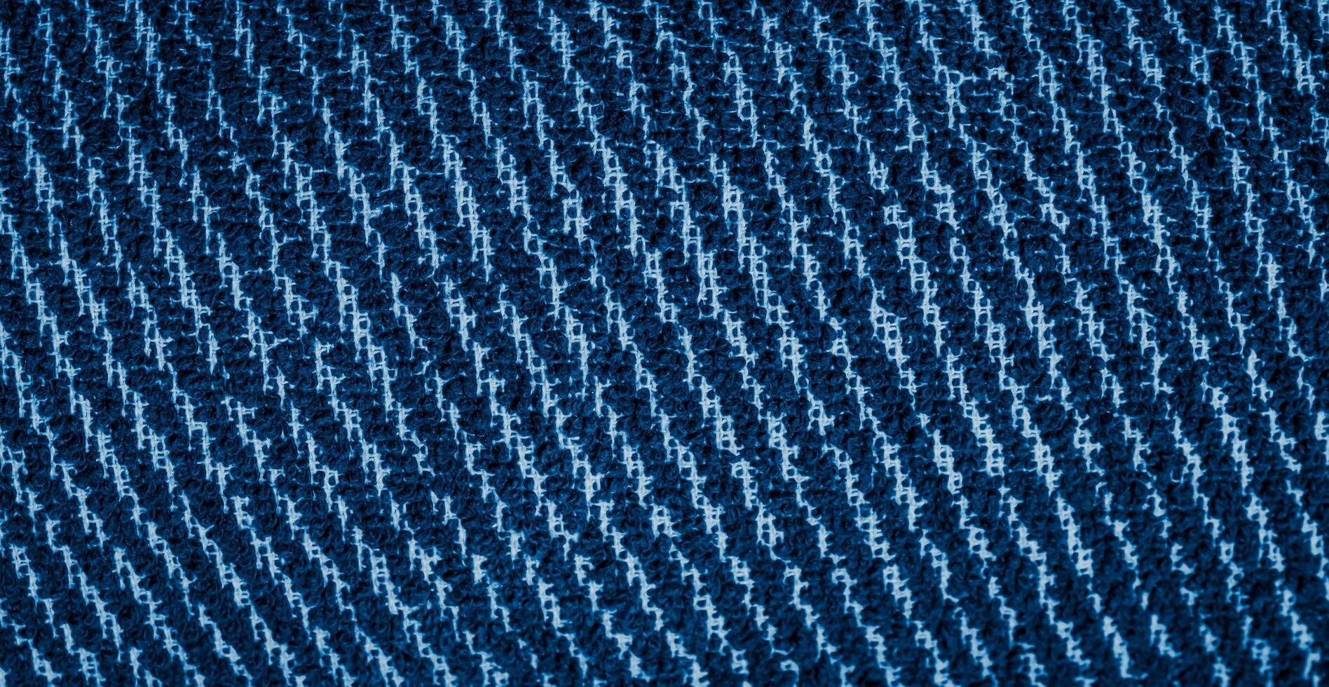 white and blue cotton fabric with a visible texture photo