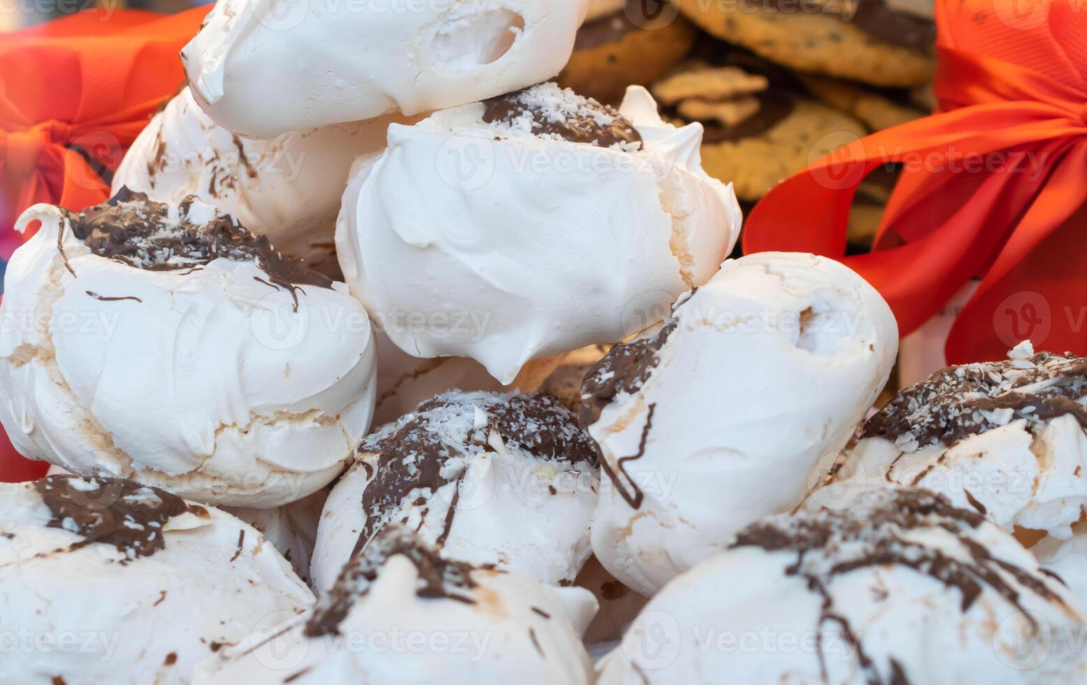 meringue cookies in a shop window. background photo