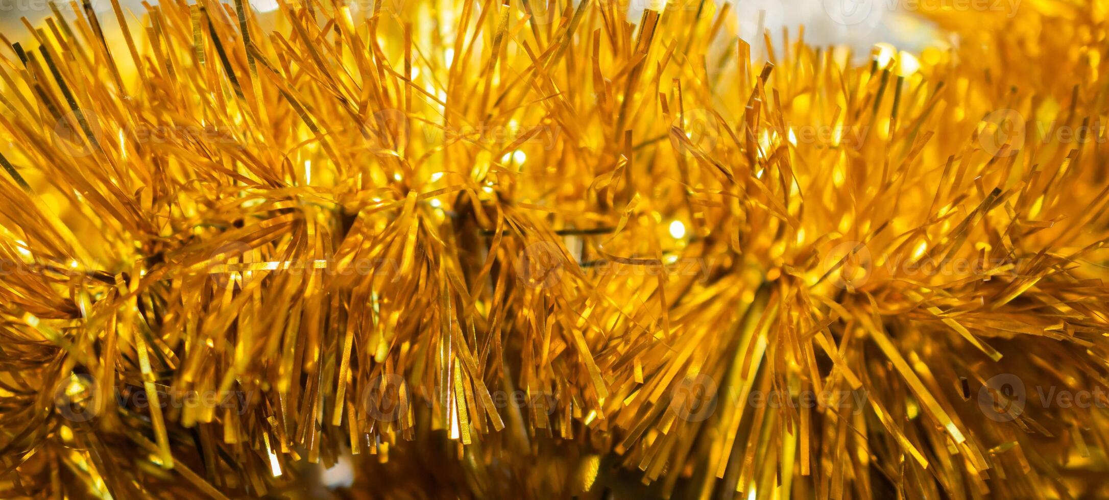 golden christmas tree chain. background or texture photo