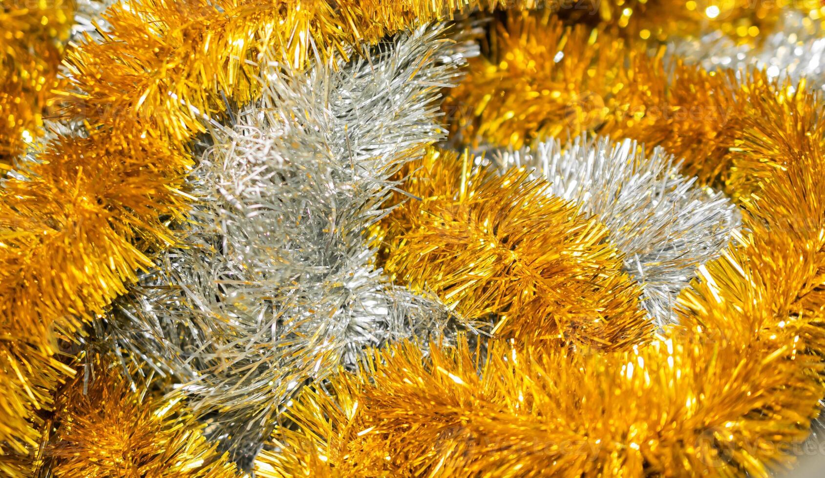 silver and gold Christmas tree chain. background or texture photo