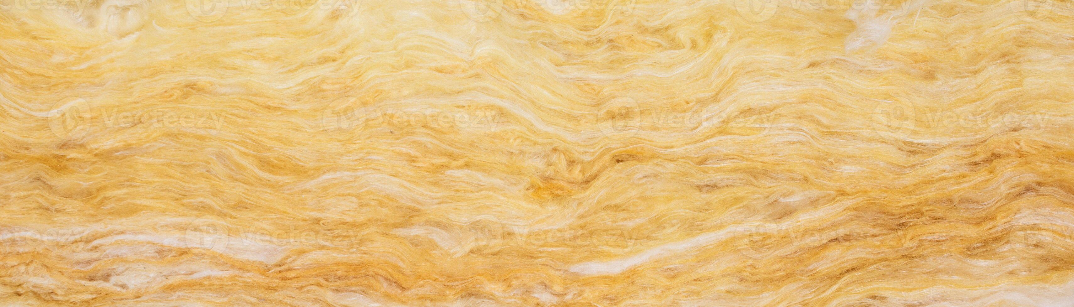 yellow mineral wool with a visible texture. background photo