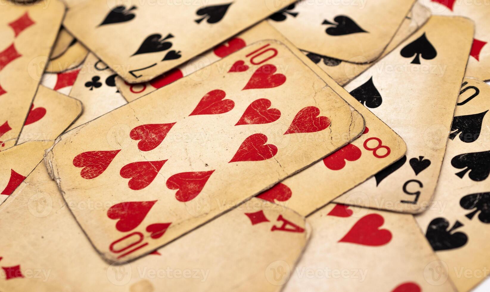 old yellowed poker cards. background or texture. photo