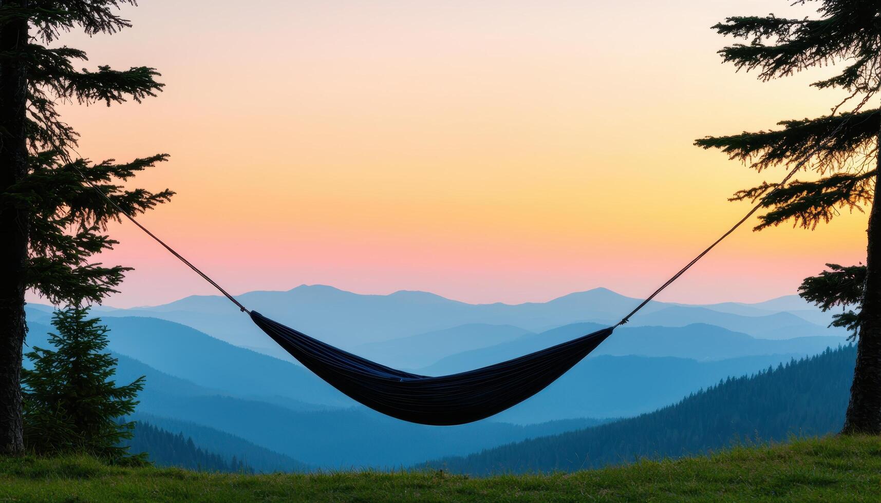 Serene sunset hammock overlooking mountain range nature background tranquil landscape outdoor adventure photo