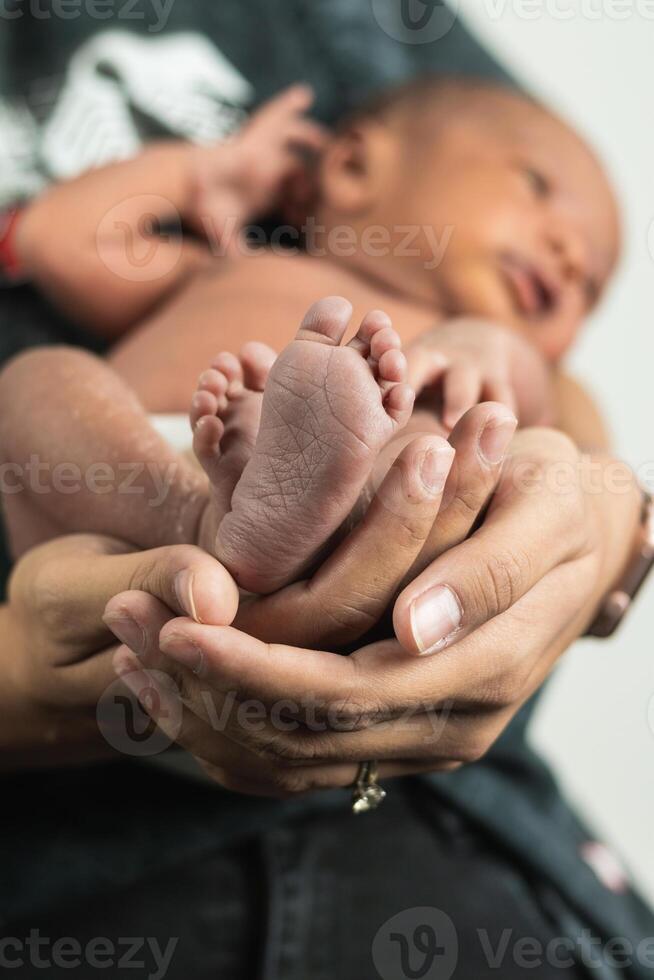 Newborn baby on soft blanket photo