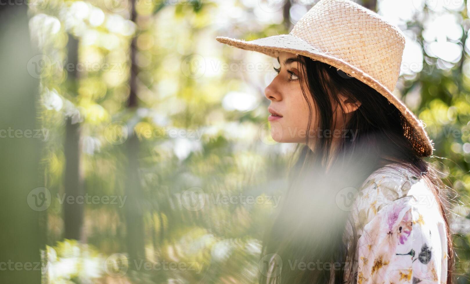 Woman enjoying a day in nature in the forest photo