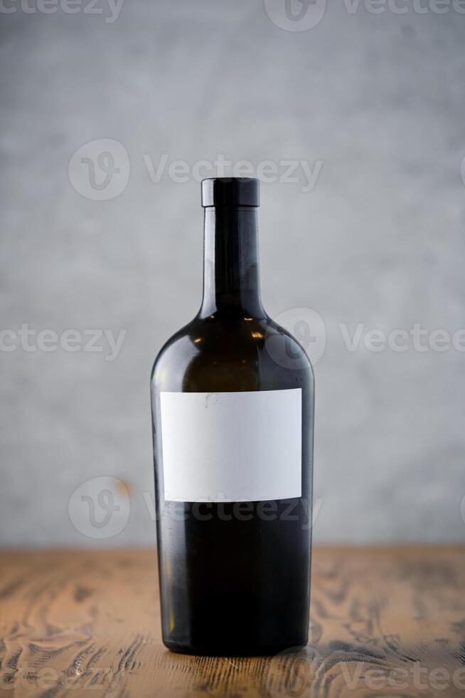 Bottle of wine on table photo