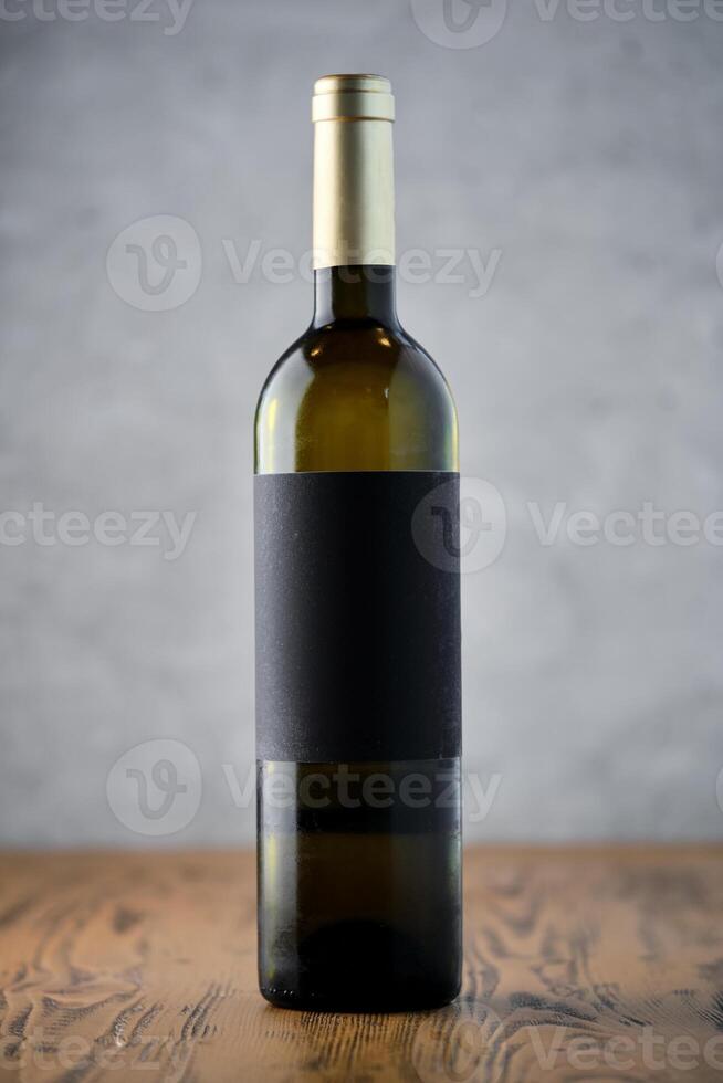 Bottle of wine on table photo