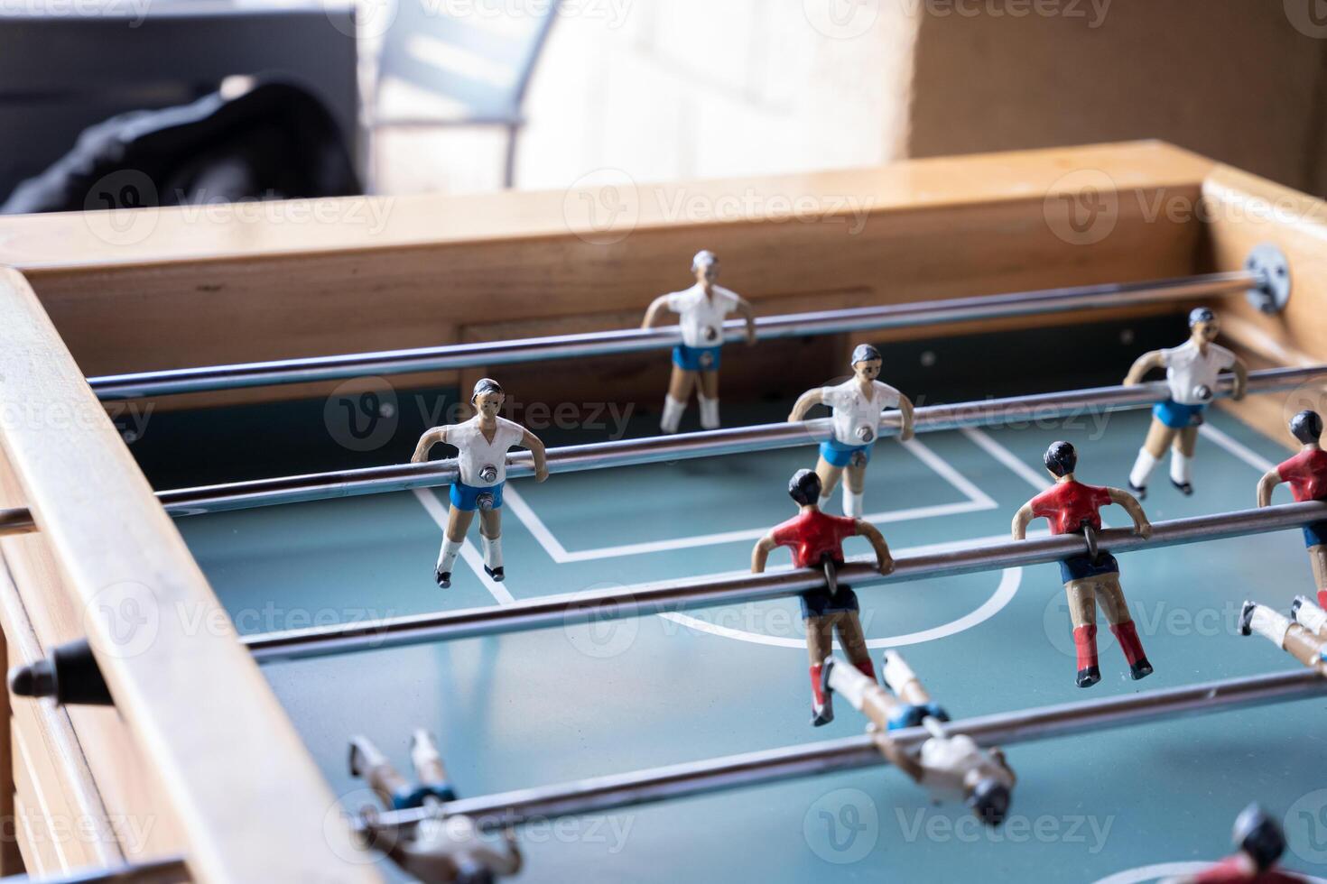 Close up of some red and white table football figures photo