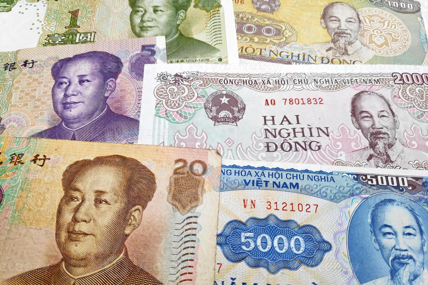Stack of Chinese Renminbi and Vietnamese Dong photo