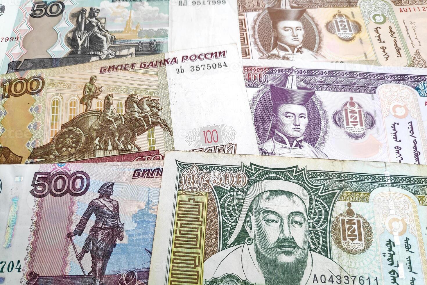 Stack of Russian Rubles and Mongolian Togrog photo