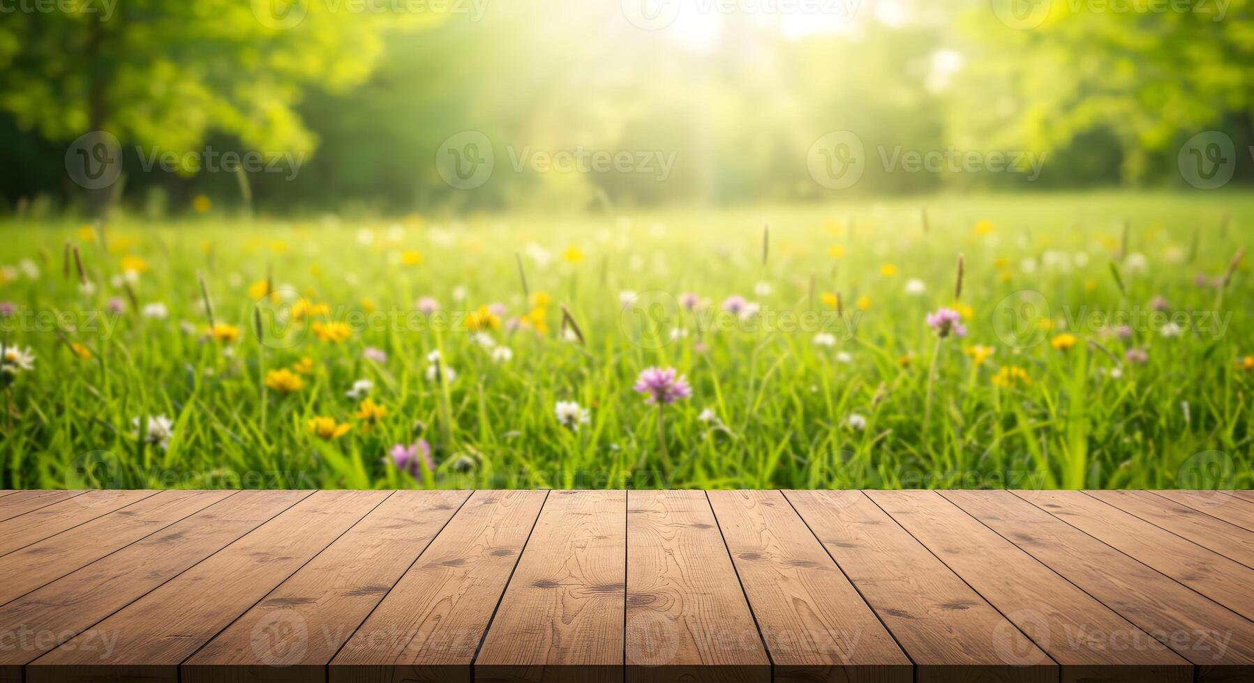 Wooden table top on blurred green field background to product display 06 photo