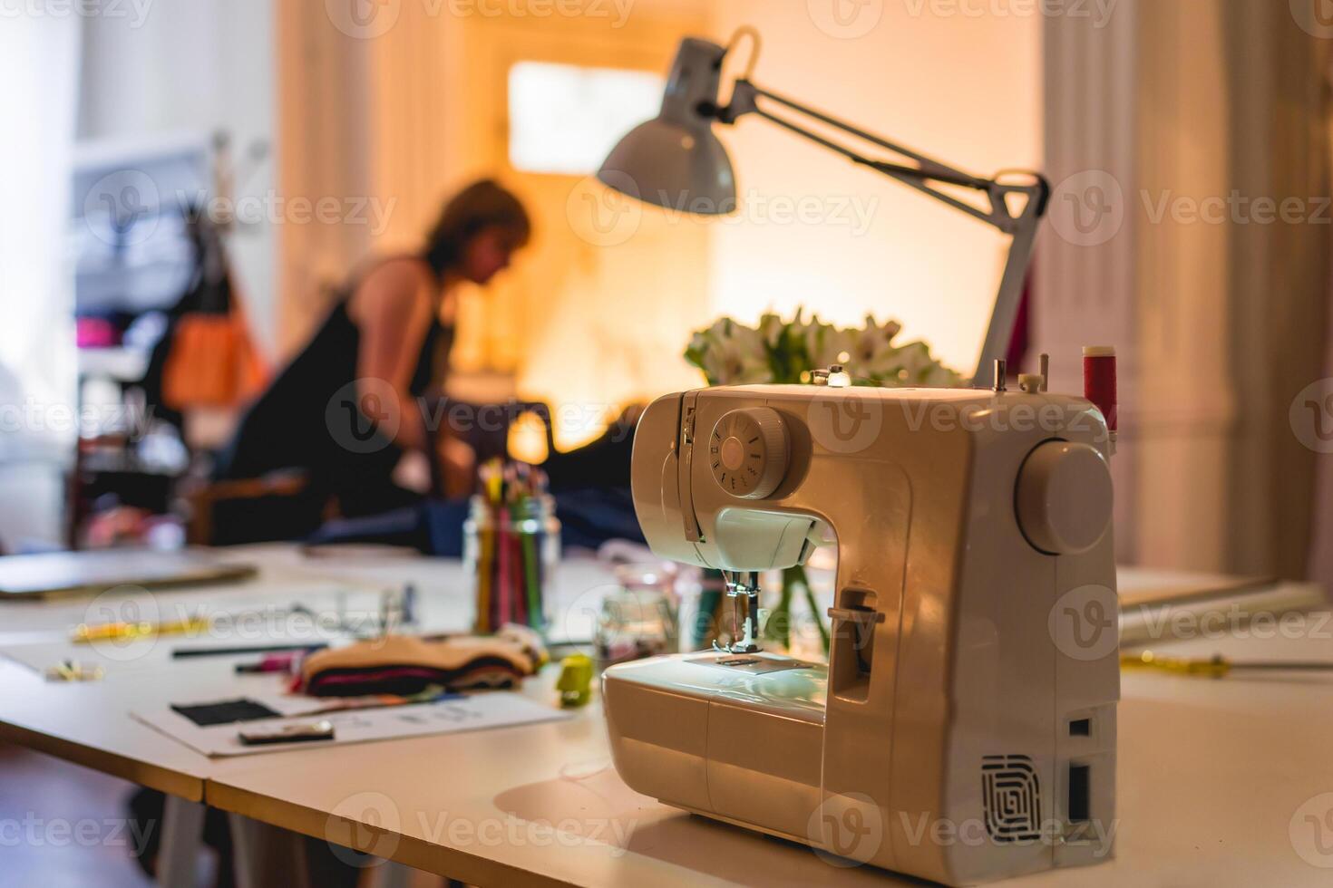 A sewing machine on a table photo